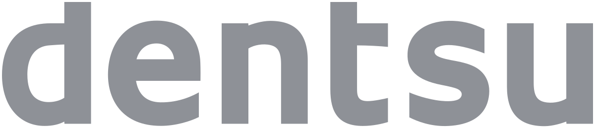 Logo of Dentsu in grey lowercase letters on a transparent background, perfectly designed for advertisers focusing on SEO and keywords.